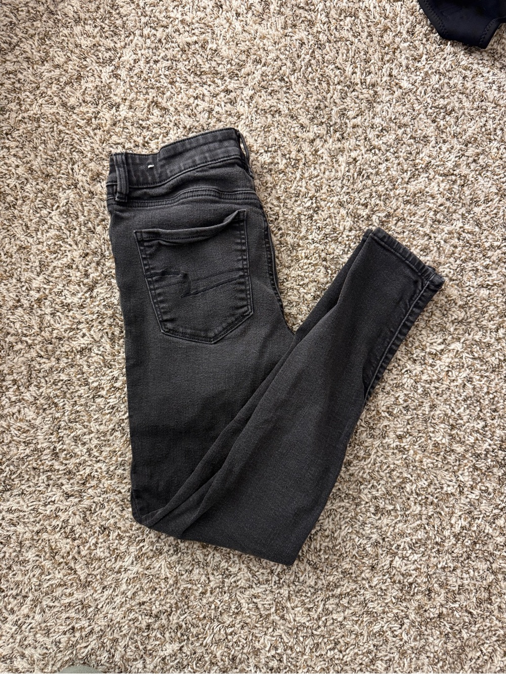 AE Next Level Stretch Black Women’s High-Rise Skinny Jeans
